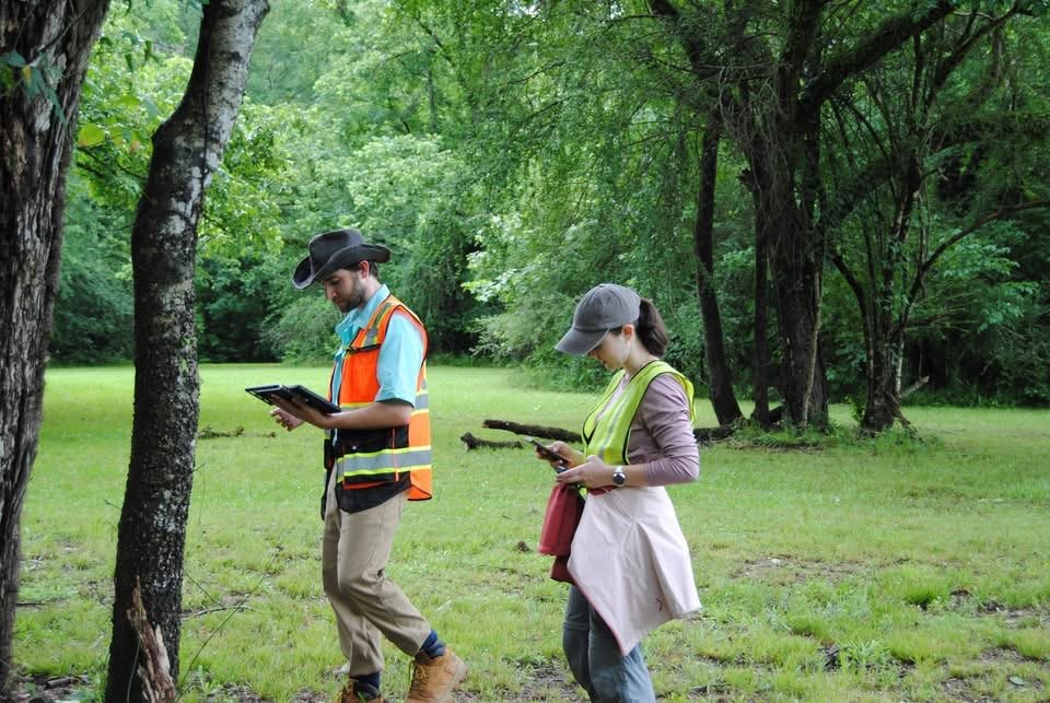 Participants using digital field records during the GIS workshop