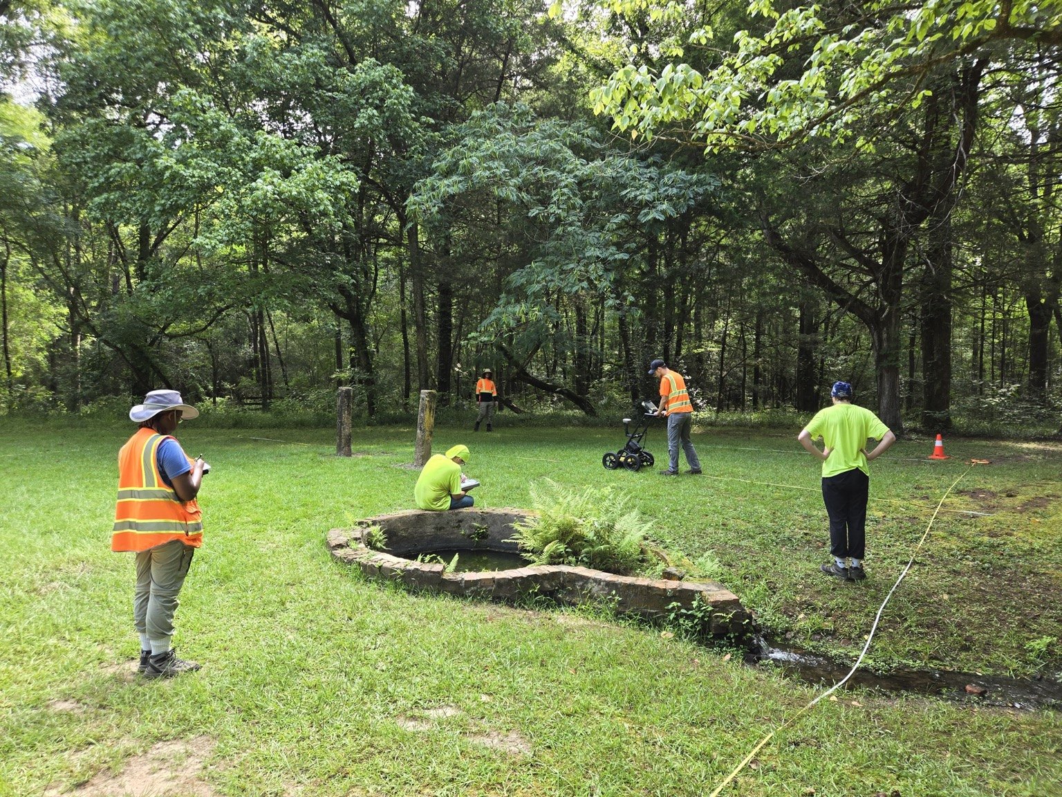 Participants collecting Ground Penetrating Radar (GPR) data near the Perine Mansion