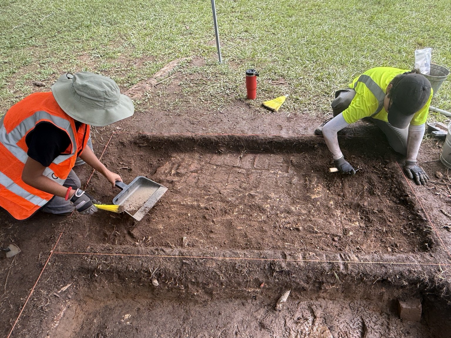 Participants carefully excavating a test unit at the Kirkpatrick Property